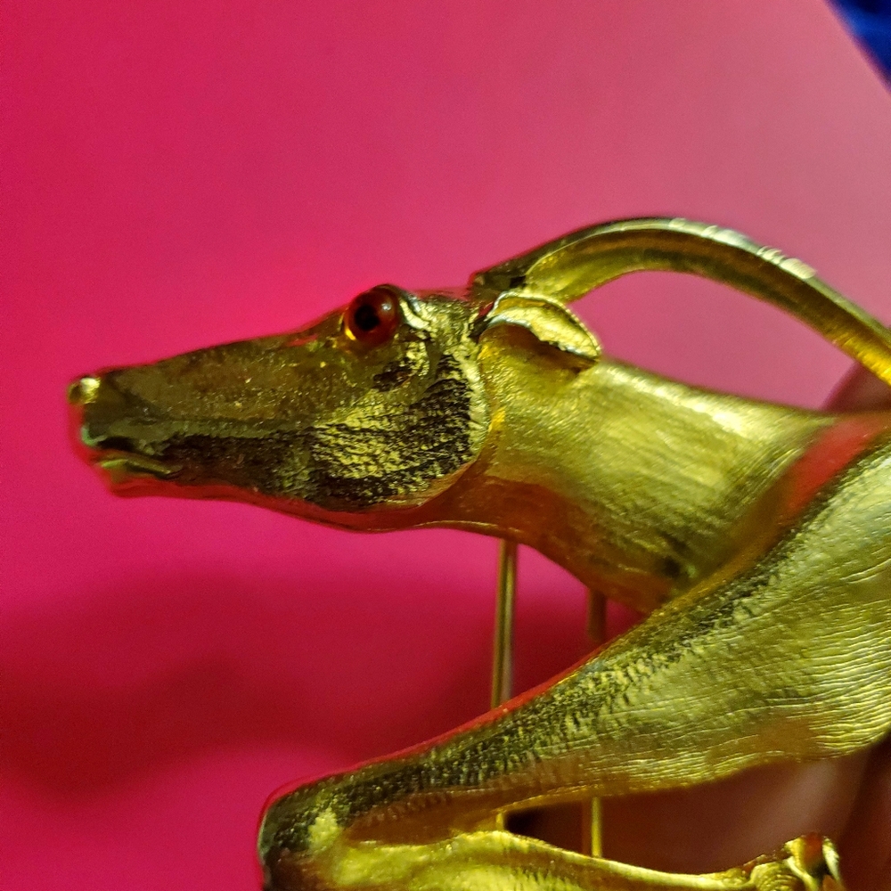 Christopher Ross 1986 Gold Caribou buckle